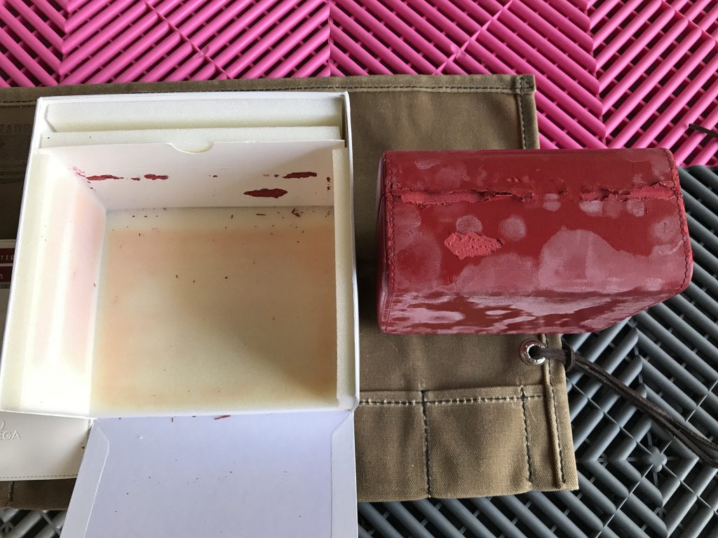 deteriorated damaged omega speedmaster red box